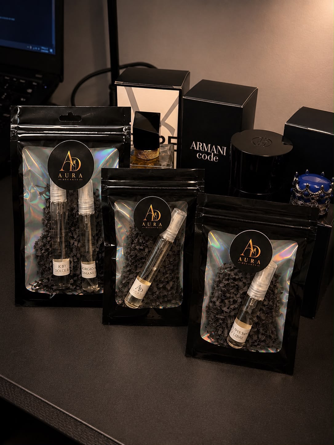 Decants empacados en bolsas Aura Decants